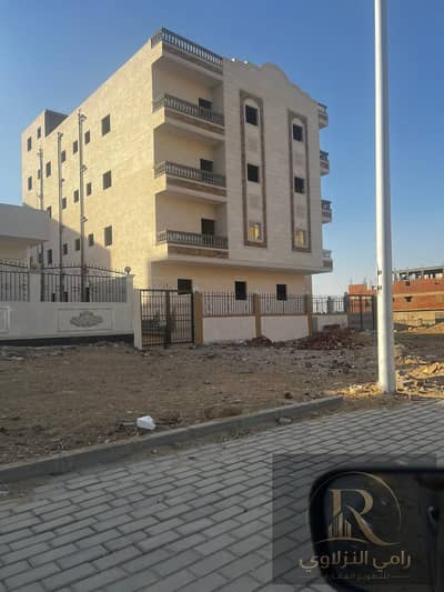 Apartment for sale, ultra-super luxury, corner building on the main street, with the National Bank on the first floor, steps to malls, the service area, and Badr University.