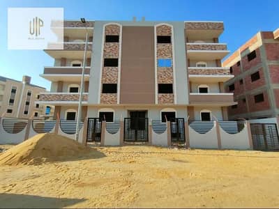 Apartment for sale in Al-Andalus 2, second number from the 90th South Road and Mohamed Nagib Axis, two minutes to the compound of Mufida and Hyde Park, northern corner, garden view.