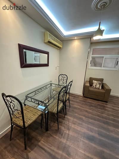 Furnished apartment for rent in Al Rehab, special finishes, ground floor with garden, 90 meters