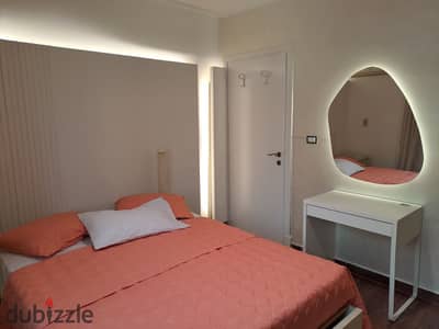 Ground floor apartment with garden for sale in Al Rehab, special finishes, garden view, close to services.