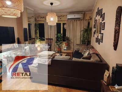Apartment for sale in Nasr City, 7th District, on Zaafarani Street, parallel to Zakaria Hussein Street. The apartment is 115 square meters and costs