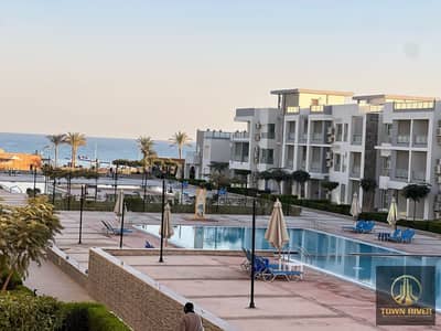Fully finished resale chalet at a price lower than the developer's rate—ready for immediate handover—in Aroma, Ain Sokhna. Features a lagoon view . . . .