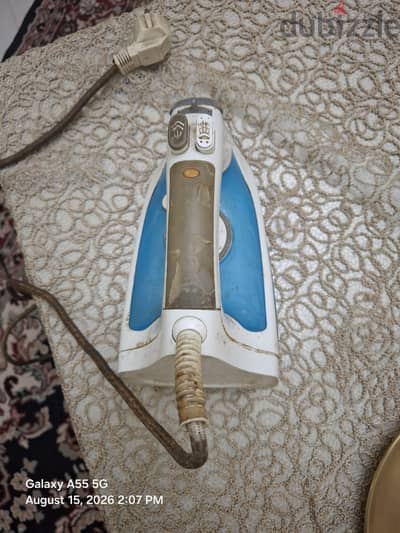 مكواة ملابس مستعملة للبيع