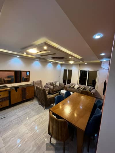 Furnished apartment for rent in Zayed Garden 1 – Sheikh Zayed with an open view directly onto the swimming pool, fully equipped and ready for immediate occupancy