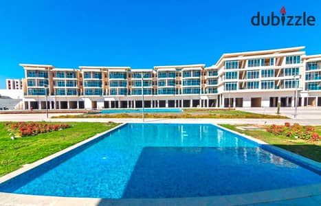 Apartment for sale, 106 sq m, in Neom Compound, in a prime location in the heart of 6th of October City.  Directly on the Middle Ring Road.
