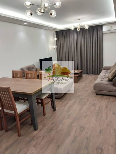 Furnished apartment for rent in Al Rehab 2, specially finished, fully air-conditioned, hotel-style furnishing