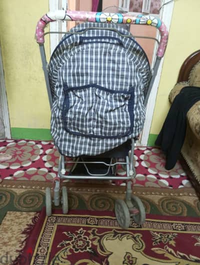 عربه لحمل الأطفال
