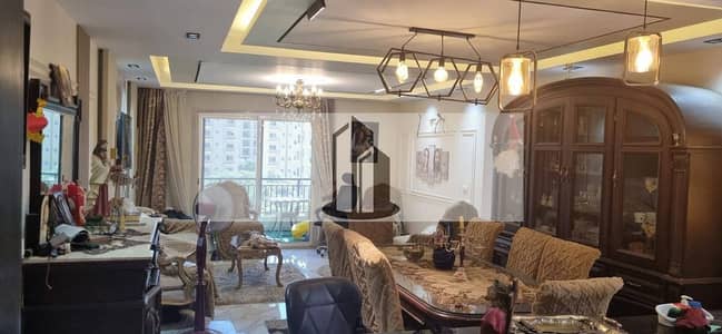 Cash price bargain: Double view apartment with open landscape view and swimming pool for sale in Taj City, within Zone T, New Cairo.