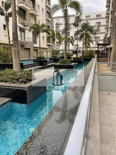 Ready-to-move-in apartment for sale in Taj Gardens, Madinet Masr. Lowest price per square meter with a spacious and well-designed layout.