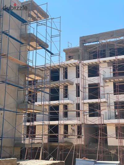 Own your apartment directly on Wahat Road, opposite O West, with just 1% down payment, installments up to 10 years, and immediate delivery.