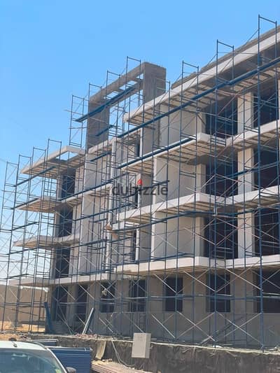 Own your ready-to-move apartment on Wahat Road, next to O West, with just 1% down payment and installments up to 10 years.