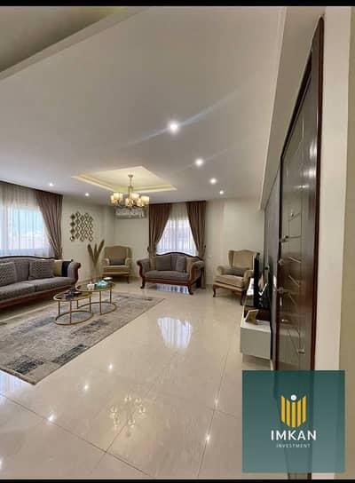 Apartment for sale in Mayan Compound with a 10-year installment plan; features ultra-super-lux finishing and a distinctive view, located just minutes