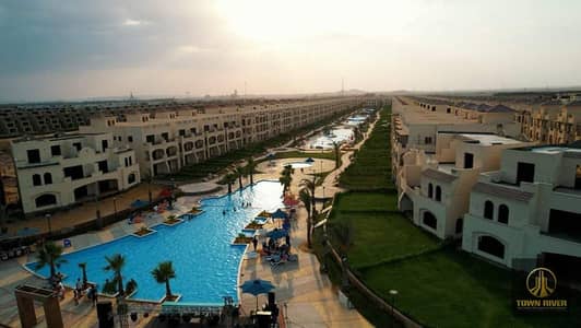 باقل من سعر الماركت شاليه تشطيب كامل ريسيل استلام فوري في لاسيرينا بالم بيتش العين السخنة Lagoon View-Open view landscape-بتفسيمه داخليه للشاليه مميزه