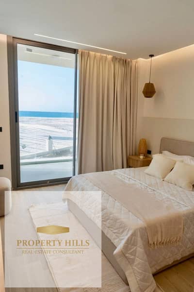 Ground floor studio with garden for sale, 40 sq m, fully finished and furnished with hotel-style finishes and a direct sea view. Ready to move in this summer.