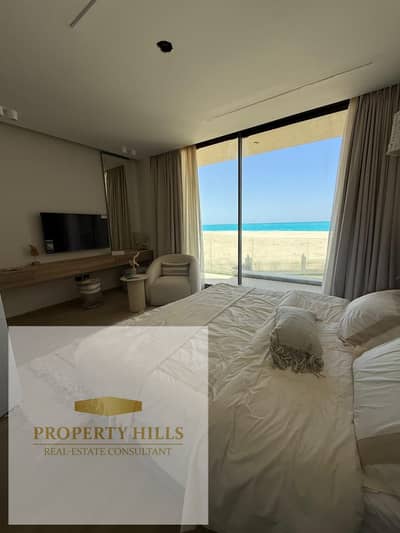 Studio apartment for sale, 53 sq m + garden, fully finished and furnished with hotel-style finishes and a direct sea view. Ready to move in this summer.