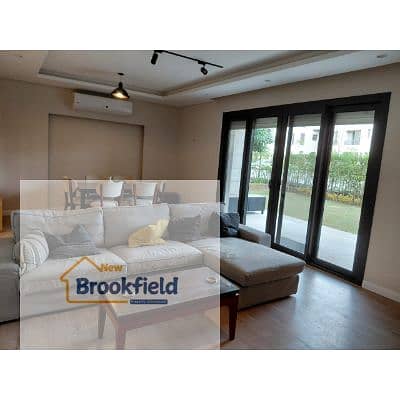 **Fully Furnished Ground Floor Apartment with Private Garden for Rent in District 5 – New Cairo**