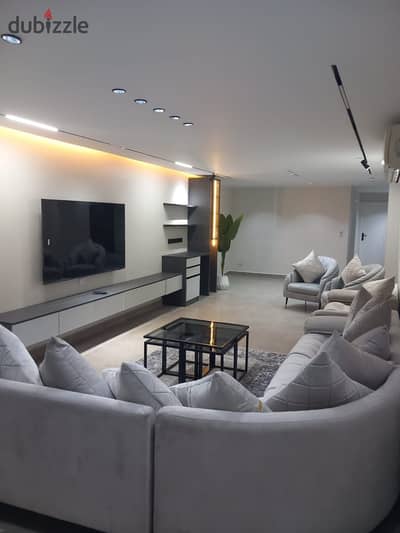 Furnished hotel apartment with hotel finishing for rent, first occupancy near Safir Hotel, for upscale living in Dokki
