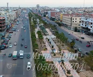 للبيع شقة أمامية 106م للبيع في شارع النصر الرئيسي  عمارة حديثة حصة في الأرض