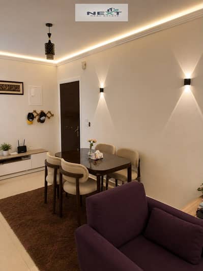 Furnished studio apartment for rent in Madinaty, 64 sq m, in B7. Special finishes, direct sea view, wide garden, very close to services, minutes from