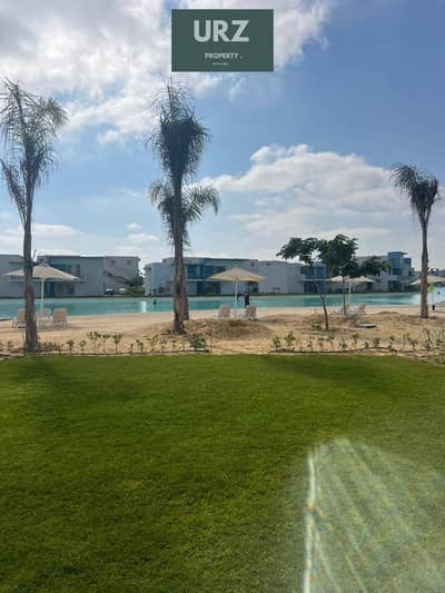 With the lowest down payment in Marsa Baghosh a ground floor chalet with a private garden full sea view fully finished next to Ramla cali Coast dose