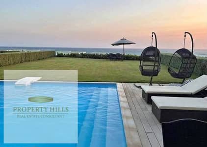 Villa for sale on the first line by the sea, ready for immediate delivery with complete finishing in a working village with an open beach, available for vacation next to Fouka Bay with installment options over 10 years with facilities.