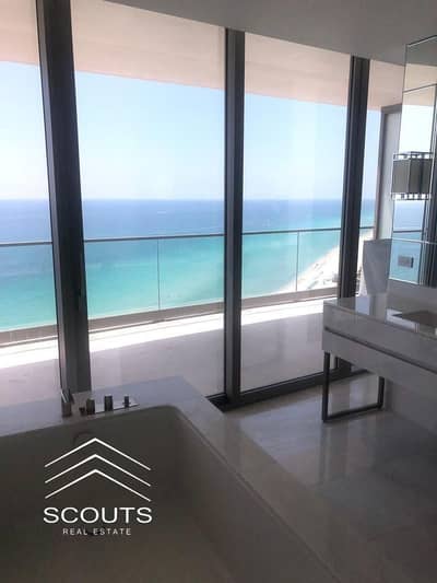 Corner apartment on the beach in New Alamein, fully finished, sea view, opposite Alamein Towers, next to Alamein Airport and Palm Hills Mazarine