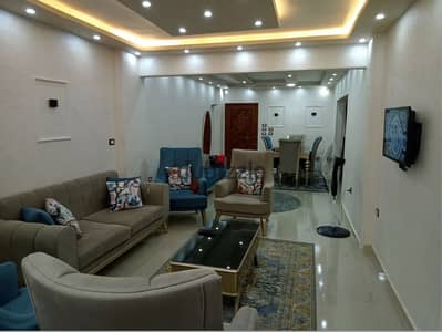 Furnished apartment ground floor with garden in Al Mamoura Beach on Nassr Street directly