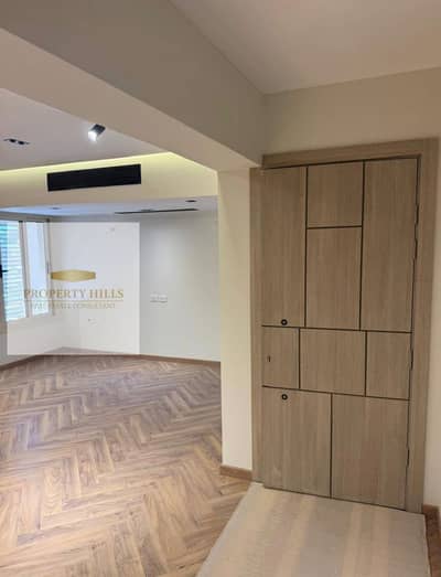 Apartment in Palm Hills Compound with a very special discount and a unique view of the lagoon, fully finished, for sale