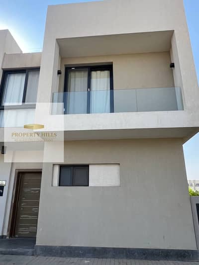 The last villa at cash price in Al Burouj Compound in El Shorouk with a large garden view on landscape
