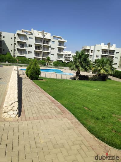 Ground-floor apartment for rent in The Address (Durra) Compound, Sheikh Zayed City Area: 109 sqm + 100 sqm private garden