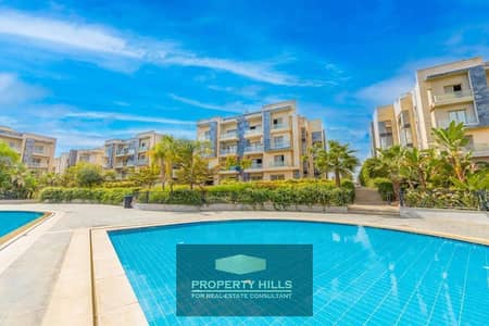 Apartment for sale 184m with private garden on Al-Wahat Road in front of MSA University, live on an island in the heart of October