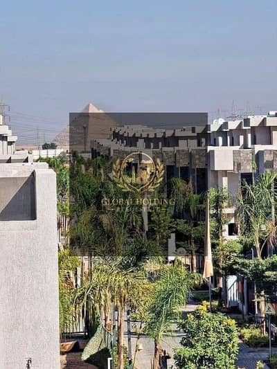 By Discount 40% get 2 Bed Ready to  move or by Install over 8 years   in front of the Pyramids and near the Grand Egyptian Museum and Mall of Egypt.