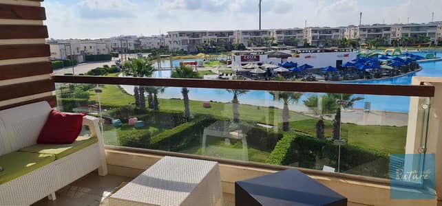 للبيع شاليه في أمواج 3غرف 2حمام مساحة 164متر دايركت علي البحيرة كوستا بحري صريح  يري البحر Amwaj North coast