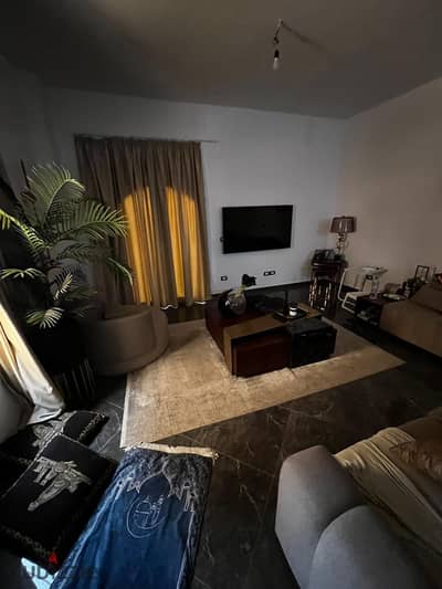 Apartment for rent in a villa in Al Narges, garden view, prime location Near services, special finishing