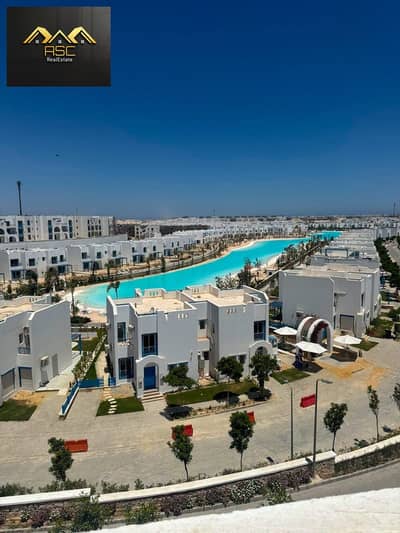 Penthouse chalet for sale – Mountain View Ras El Hekma, North Coast. Prime location with a stunning lagoon view and a view of the swimming pool.