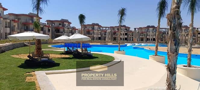 Receive a finished chalet at a special price directly on the lagoon with an open view of the Alamein Towers
