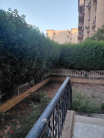In Al-Rihab, a ground floor apartment with a garden near Avenue for rent