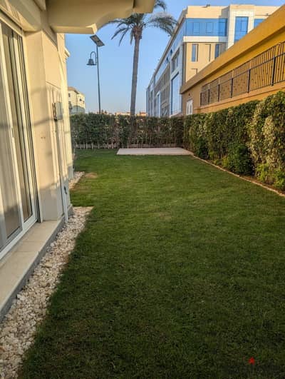 شقة للايجار ارضي بجاردن في كمباوند ميفيدا افينيوس بالمطبخ والتكييفات ، التجمع الخامس القاهرة الجديدة