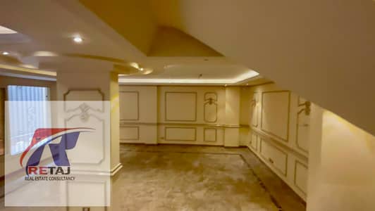 Duplex for rent with air conditioning, ultra-super-lux finish, first occupancy, prime location in Al Narges Buildings, overlooking villas, opposite Al