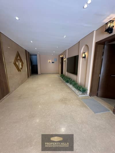 Duplex for sale in the finest location with a distinctive view of the landscape, minutes from Hyper One and Mall of Arabia