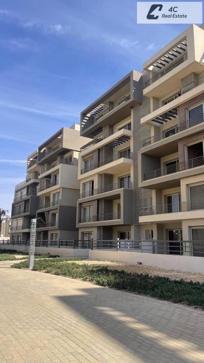 213m² resale apartment with remaining installments in Palm Hills New Cairo, open view landscape, with a distinctive layout, ready for viewing.
