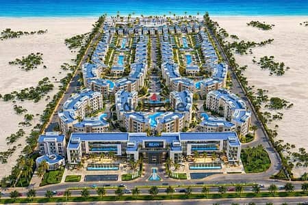 شاليه غرفتين متشطب بالكامل بجاردن شايف البحر في كيو باي الساحل بمقدم 10% وقسط على 8 سنين لوكيشن مميز جمب مارينا
