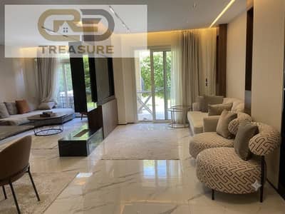 furnished Apartment with garden for sale in Stone Residence - new cairo