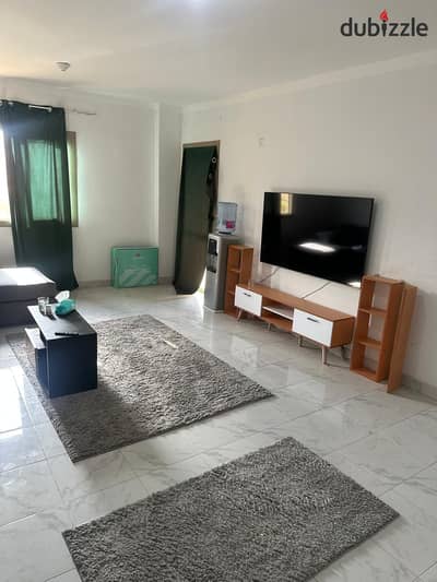 A finished apartment for sale in the Al-Ashrafiya compound, First Settlement, behind Waterway
