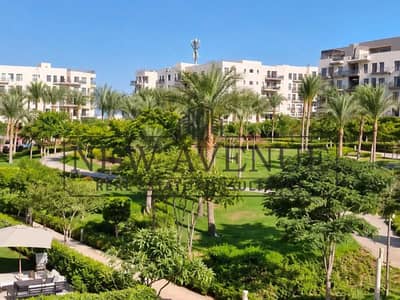 Immediate delivery fully finished apartment with ACs kitchen cabinets and 3 wide Terraces on open view in Eastown New Cairo developed by Sodic
