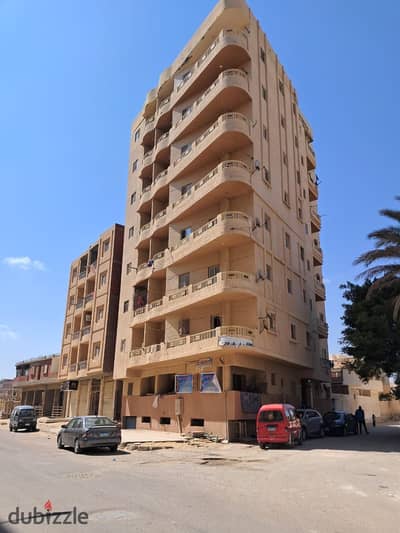 Opportunity to own a 90 m apartment with two rooms and a reception on the elevated ground floor with a balcony in the middle of Matrouh, super lux