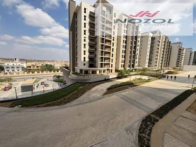 شقة دور عاشر للبيع متشطبة تكملة اقساط بفيو مباشر على زيد بارك في كمبوند زيد ويست - الشيخ زايد | ZED West