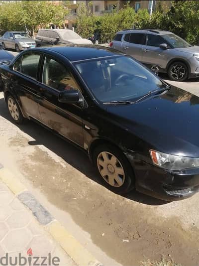 ميتسوبيشي لانسر 2008 بحالة الفابريكا فابريكا بالكامل