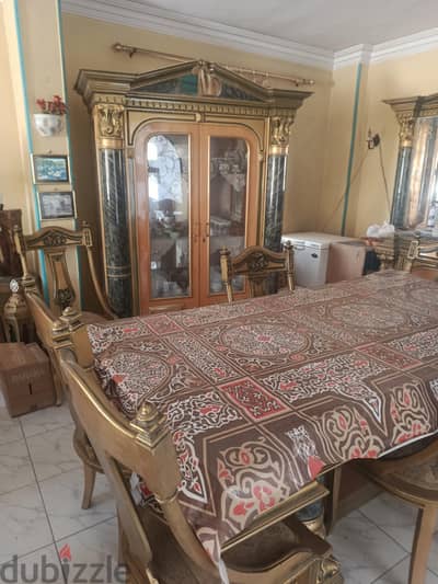 ترابيزة سفرة و8 كراسى ونيش بحالة الجديد