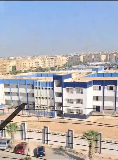 Apartment for rent in the "Small Investor" (Al-Mostathmer Al-Saghir) area, Sheikh Zayed. Features a high-end finish, a prime location, and a wonderful